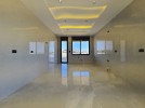 Ground floor with roof for sale in Qaryet Al Nakheel an area 200m