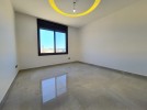 Ground floor with roof for sale in Qaryet Al Nakheel an area 200m