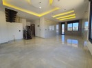 Ground floor with roof for sale in Qaryet Al Nakheel an area 200m