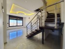 Ground floor with roof for sale in Qaryet Al Nakheel an area 200m