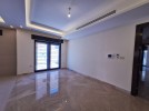 Ground floor with a garden for sale in Al-Kursi an area of 170m