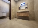 Flat ground floor with garden for sale in Al Thuhair an area of 365m