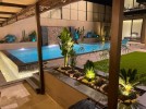 Two farms with pool for sale in Al-Ghor with a land area of 720m