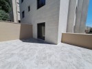 Duplex ground floor apartment with garden for sale in Al-Kursi 175m