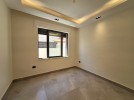 Duplex ground floor apartment with garden for sale in Al-Kursi 175m