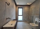 Semi-ground floor apartment for sale in Dabouq 365m