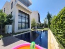 Standalone villa with a pool for sale in Airport Road area of 940m