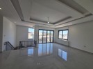 Flat and duplex apartment with garden for sale in Dabouq 450m