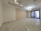 Apartment with garden for sale in Al Bunayyat building area of 156m