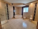 Standalone villa for sale in Abdoun with a building area of 1210m