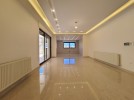 Apartment with terrace for sale in Hjar Al-Nawabelseh area of 240m