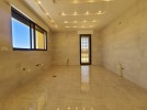 Ground floor with a terrace for sale in Hjar Al-Nawabelseh area 200m