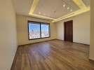 Ground floor with a terrace for sale in Hjar Al-Nawabelseh area 200m