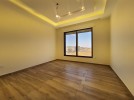 Ground floor with a terrace for sale in Hjar Al-Nawabelseh area 200m