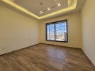 Apartment with garden for sale in Hjar Al Nawabelseh area of 187m