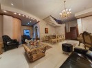 Furnished attached villa with pool for sale in Al Thuhair of 1050m