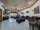 Furnished attached villa with pool for sale in Al Thuhair of 1050m