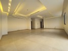 Apartment with a garden for sale in Rujm Omaish building area 220m