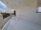 First floor apartment for sale in Hai Al Sahaba a total area of 180m