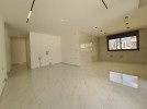 First floor apartment for sale in Hai Al Sahaba a total area of 180m