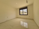 First floor apartment for sale in Hai Al Sahaba a total area of 180m