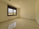 First floor apartment for sale in Hai Al Sahaba a total area of 200m