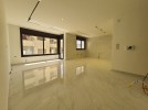 First floor apartment for sale in Hai Al Sahaba a total area of 200m