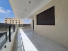 First floor apartment for sale in Hai Al Sahaba a total area of 200m