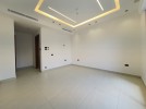 Second floor apartment for sale in Rujm Omaish building area of 250m