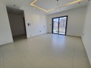 Second floor apartment for sale in Rujm Omaish building area of 250m