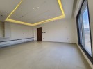 Second floor apartment for sale in Rujm Omaish building area of 250m