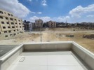 Second floor apartment for sale in Rujm Omaish building area of 250m