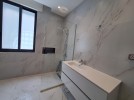 Standalone villa with pool for sale in Abdoun a building area of 1300m