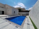 Standalone villa with pool for sale in Abdoun a building area of 1300m