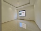 Second floor apartment for sale in Al Bunayyat an area of 205m