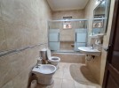 Last floor apartment for sale in Al Rawabi 211m