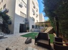 Ground floor apartment with garden for sale in Khalda - Al-Hamshari - 300m