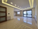 Apartment with garden for sale in Hai Al-Sahaba, building area 221m