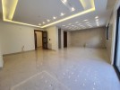 Apartment with garden for sale in Hai Al-Sahaba, building area 221m