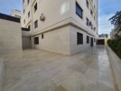 Apartment with garden for sale in Hai Al-Sahaba, building area 221m