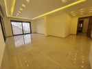 Apartment with garden for sale in Hai Al-Sahaba, building area 221m