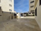 Ground floor with garden for sale in Hai Al-Sahaba, building area 210m