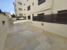 Ground floor with garden for sale in Hai Al-Sahaba, building area 210m