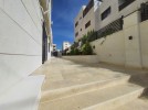 Ground floor with garden for sale in Hai Al-Sahaba, building area 210m