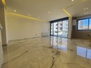 First floor for sale in Hai Al Sahaba with a building area of 130m