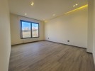 First floor for sale in Hai Al Sahaba with a building area of 130m