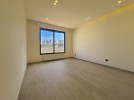 Second floor for sale in Hai Al Sahaba with a building area of 110m