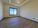 Ground floor apartment with garden sale in Rujm Omaish with area of 235m