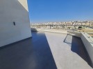 Flat roof with high view for sale in Rujm Omaish, building area of 225m