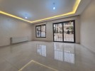 Ground floor with terrace for sale in Qaryet AL-Nakheel 250m 